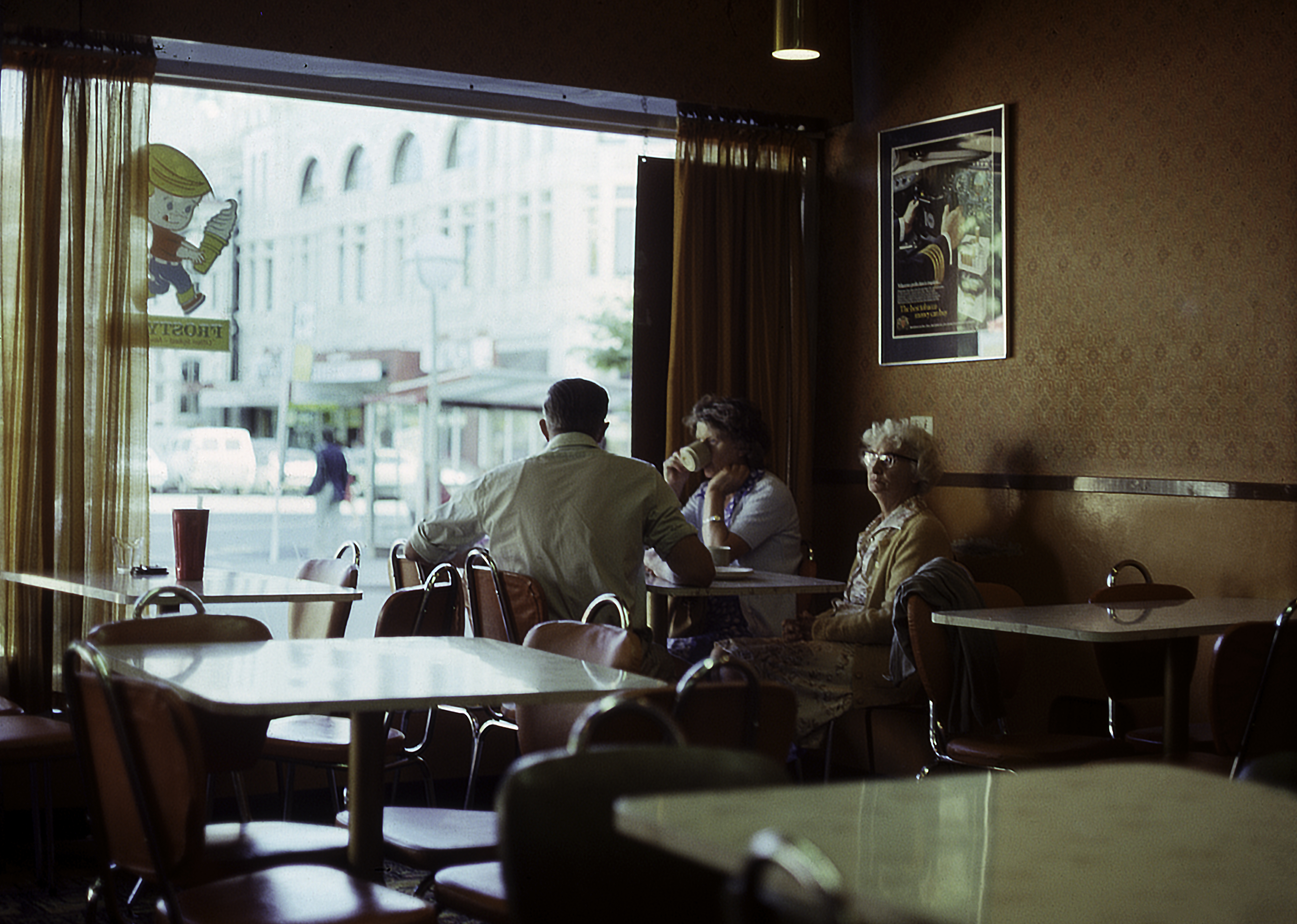 Seated trio in Christchurch Cafe by the window, Christmas 1981